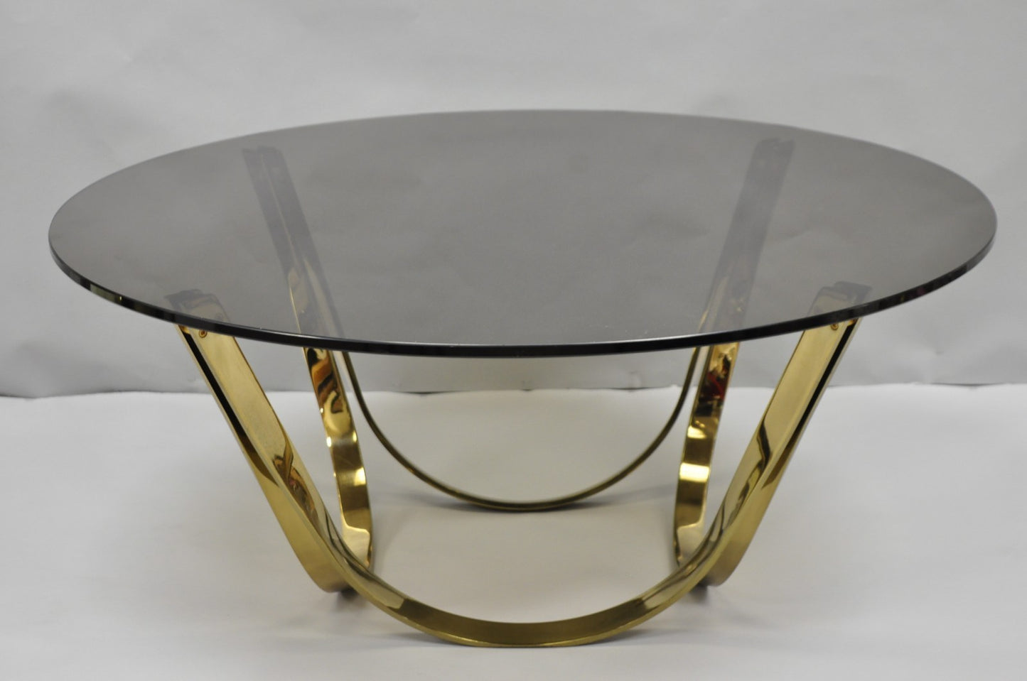 Tri-Mark Mid Century Modern Brass Plated Steel Smoked Glass Arch Coffee Table