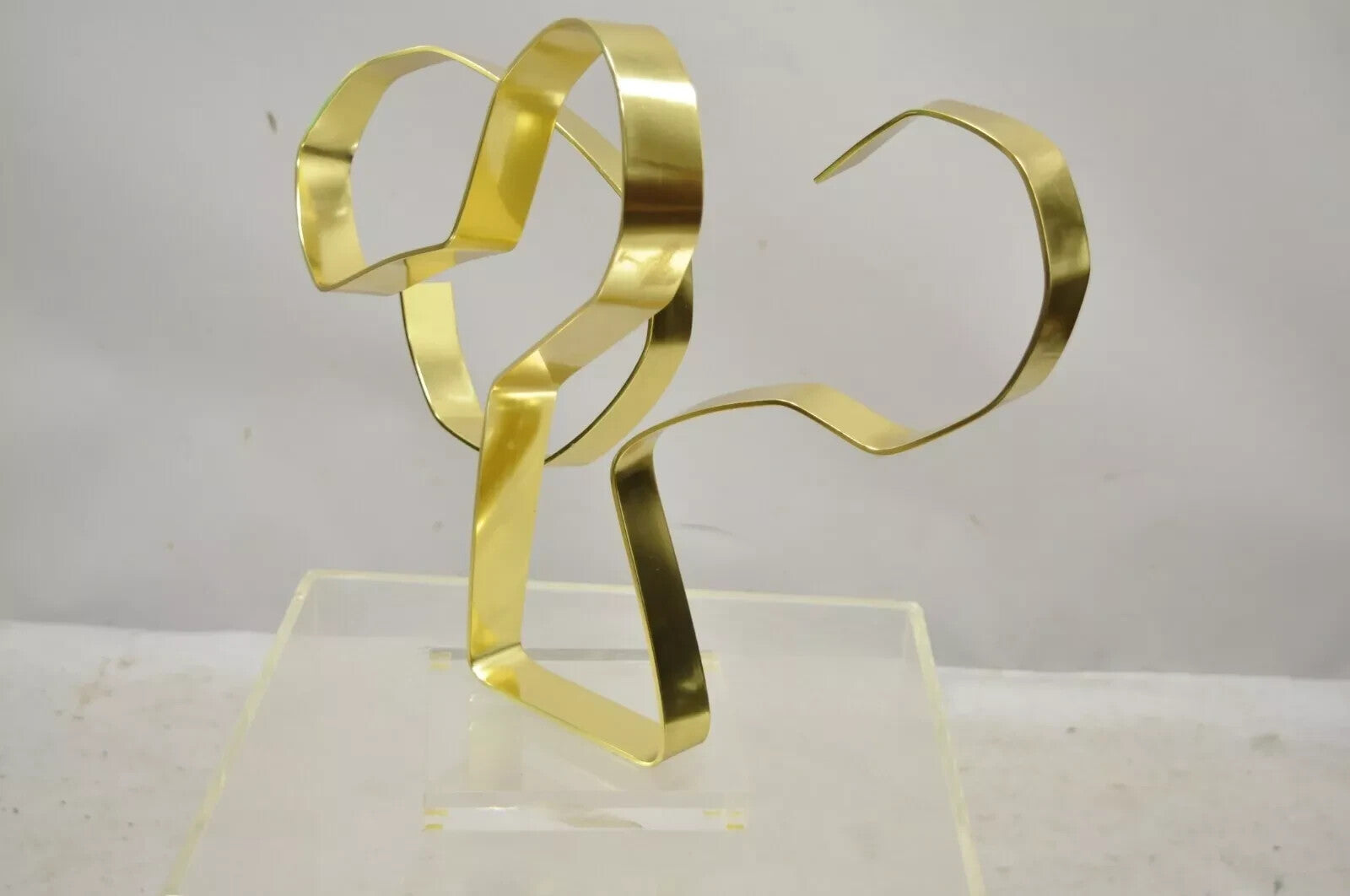 Vintage Dan Murphy 1976 Brass Ribbon Modern Abstract Sculpture on Lucite Base