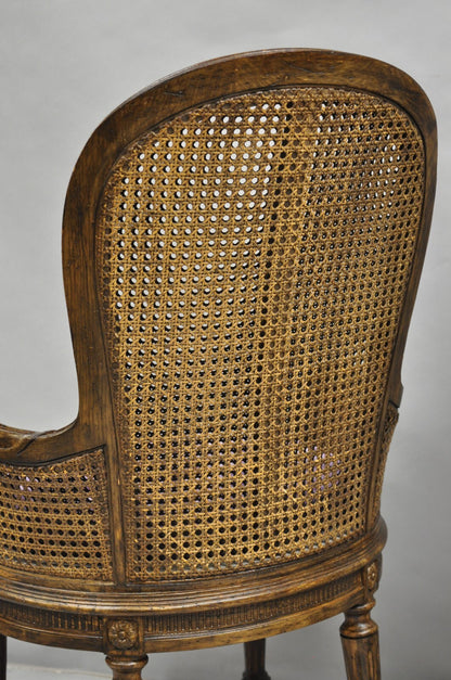 Vintage French Louis XVI Style Cane Balloon Back Walnut Arm Chairs - a Pair
