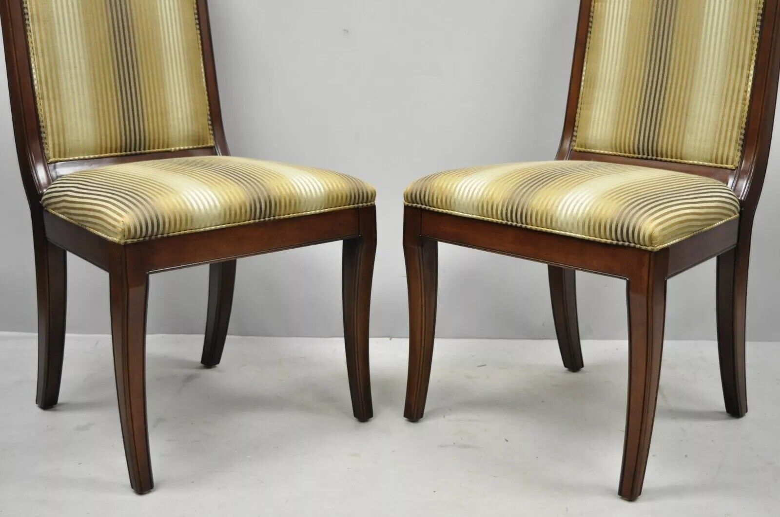 E.J. Victor Regency Style Saber Leg Mahogany Dining Room Side Chairs - a Pair