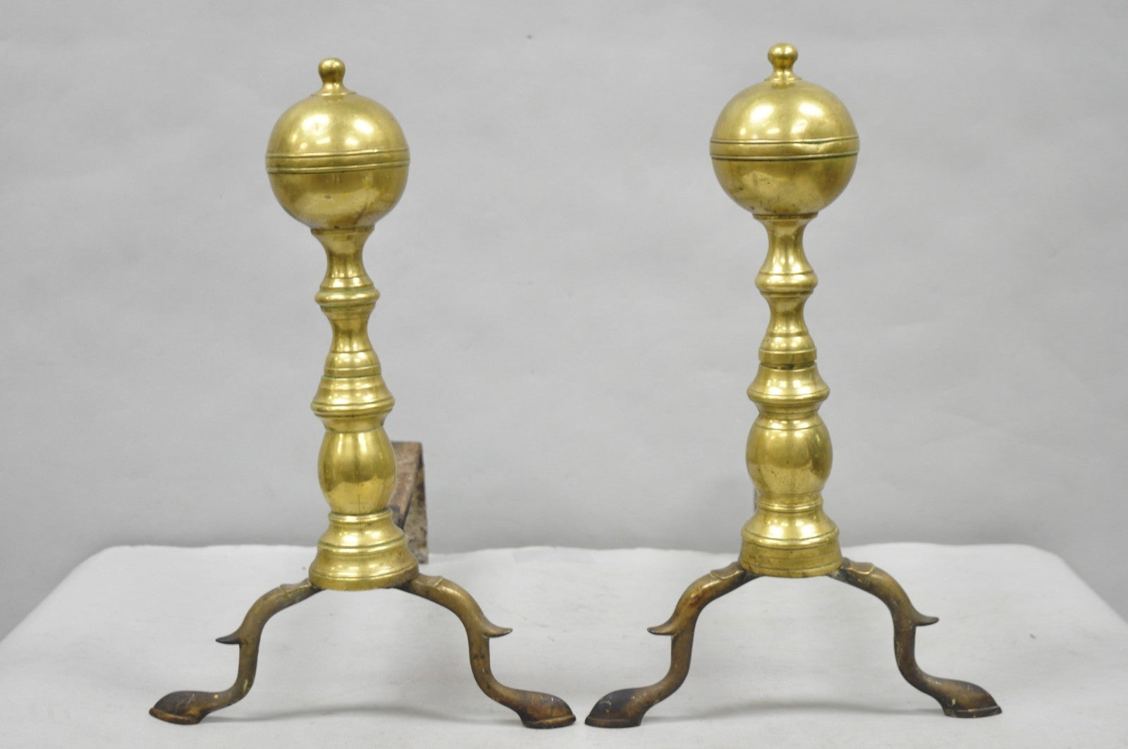 Antique English Colonial Brass Cannonball Branch Leg Andirons w/ Patina - a Pair