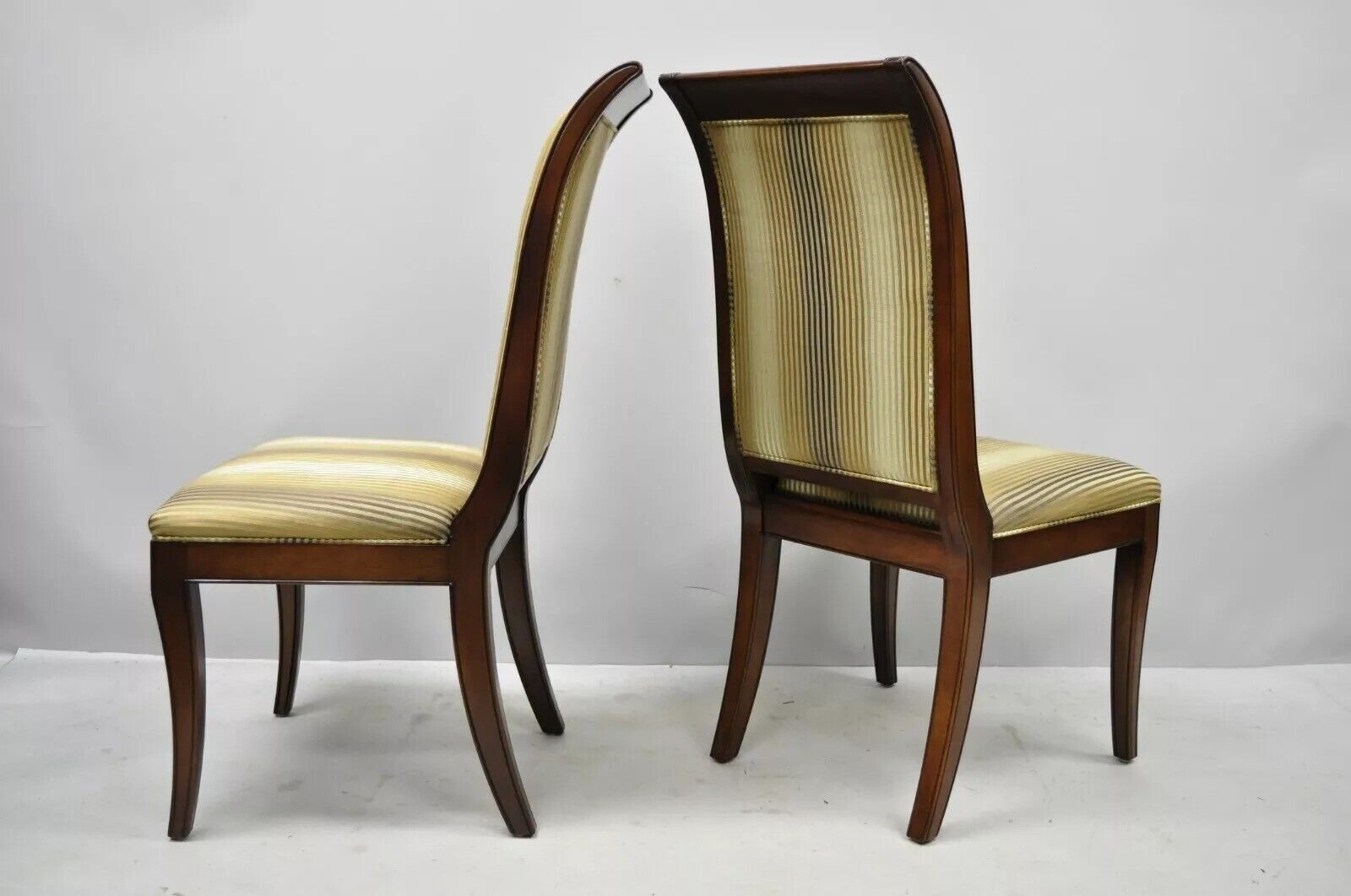 E.J. Victor Regency Style Saber Leg Mahogany Dining Room Side Chairs - a Pair