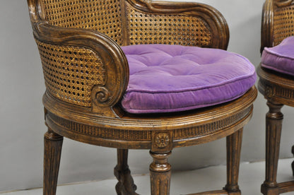 Vintage French Louis XVI Style Cane Balloon Back Walnut Arm Chairs - a Pair