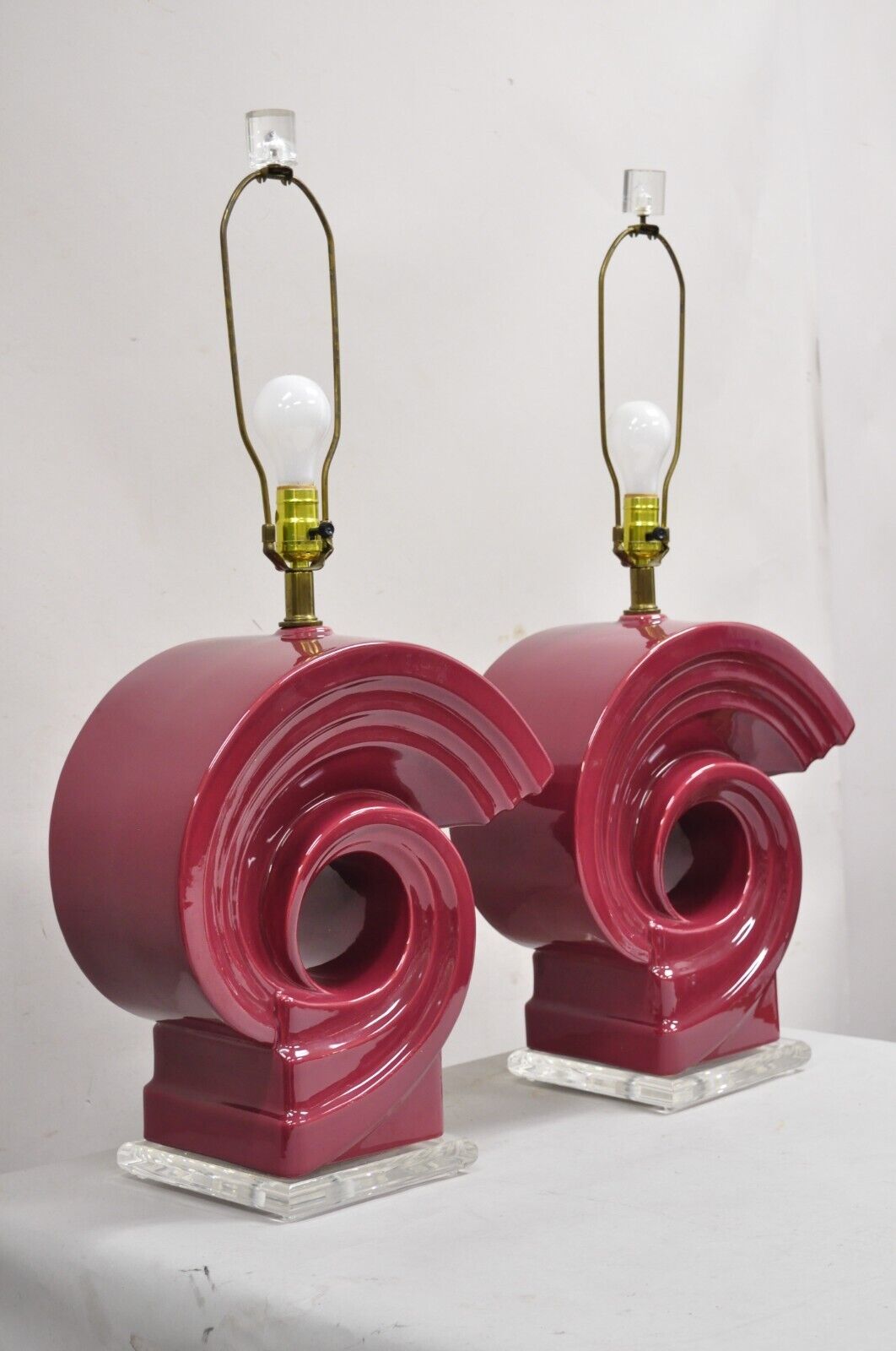 Vintage Postmodern Cranberry Red Sculptural Snail Scroll Ceramic Table Lamp Pair