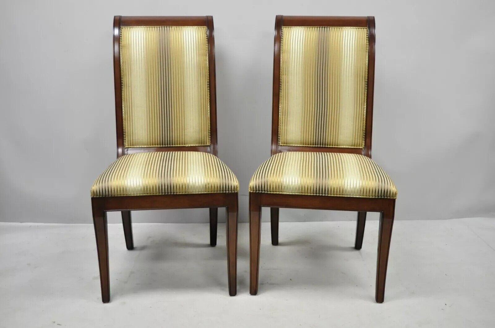 E.J. Victor Regency Style Saber Leg Mahogany Dining Room Side Chairs - a Pair