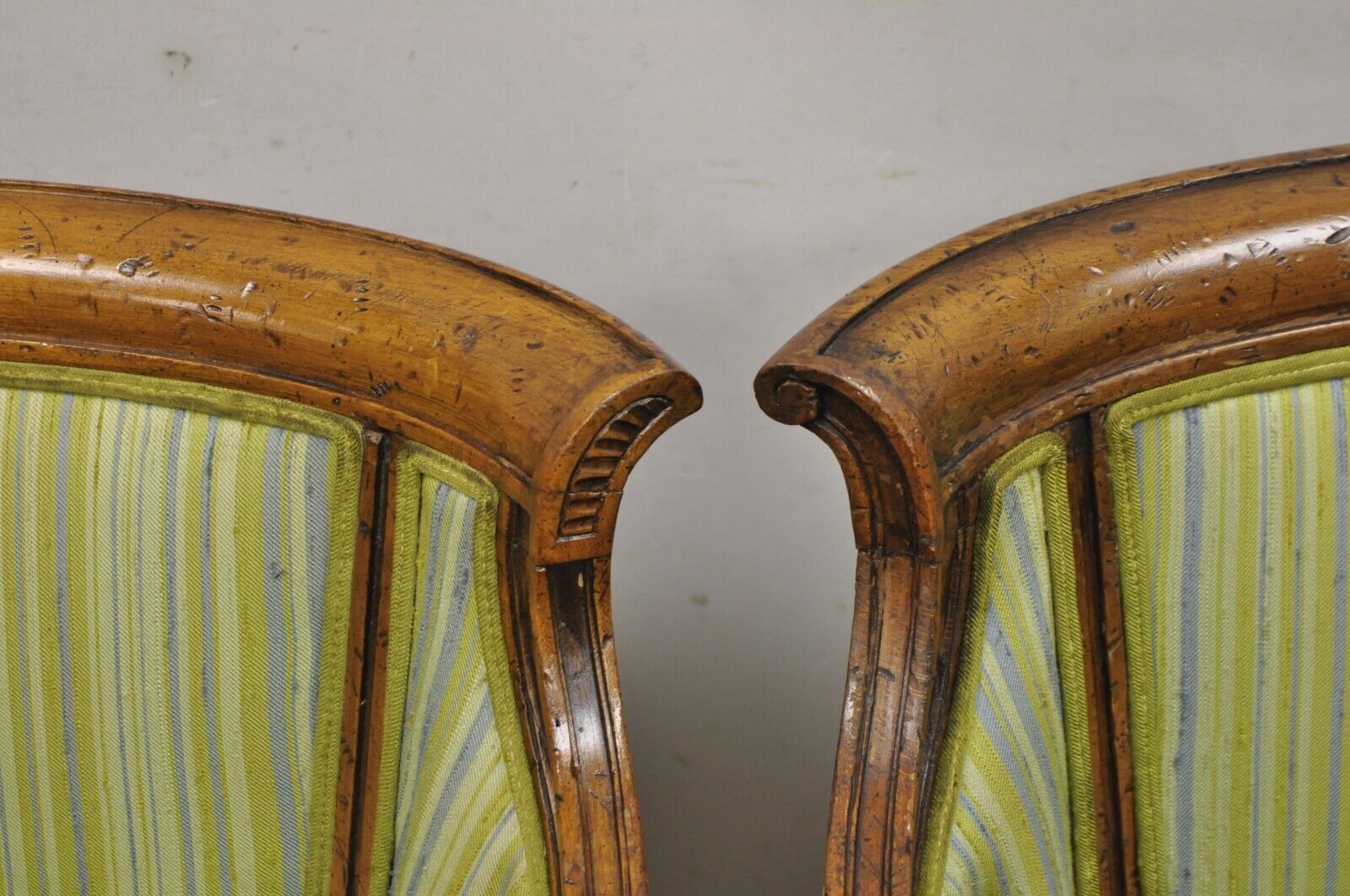 Antique Italian Regency Distressed Carved Walnut Barrel Back Club Chairs - Pair