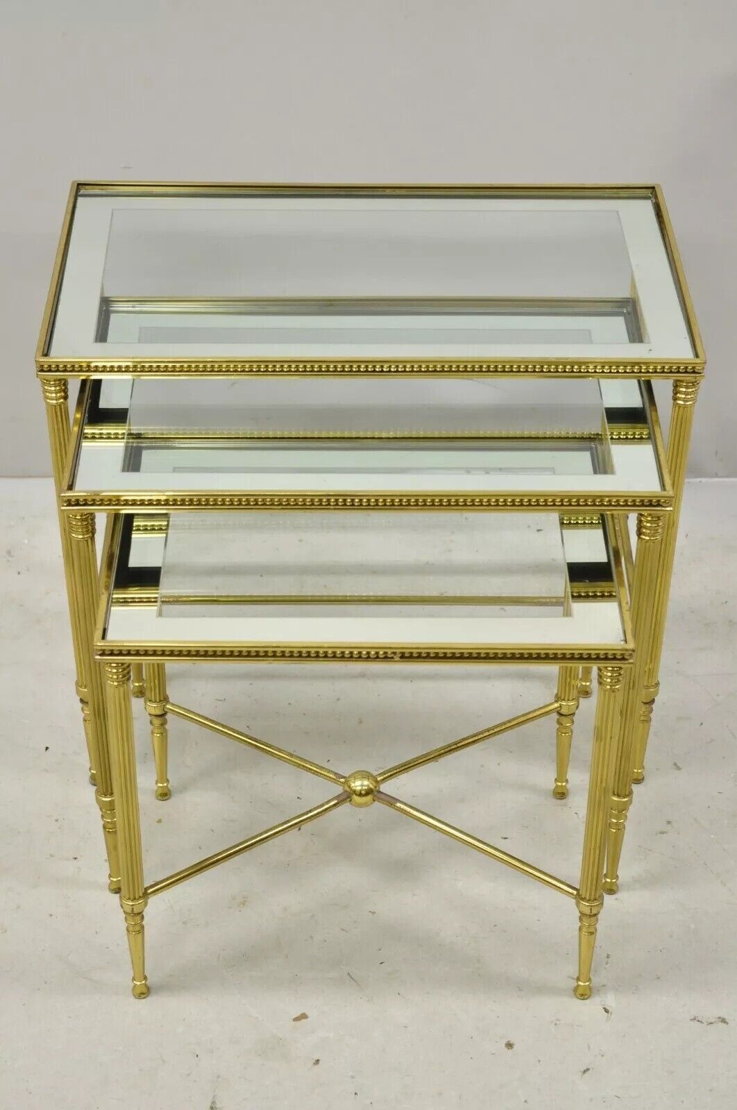 Italian Hollywood Regency Brass Mirror Glass Top Nesting Side Tables - Set 3