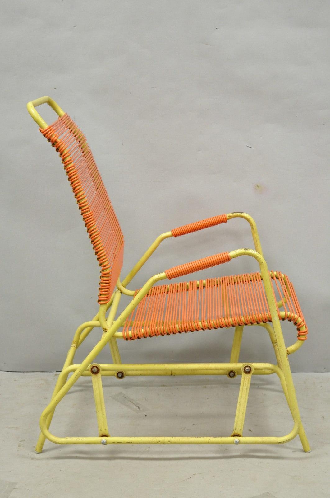 Vintage Mid Century Modern Orange Vinyl Spaghetti Strap Glider Lounge Chair