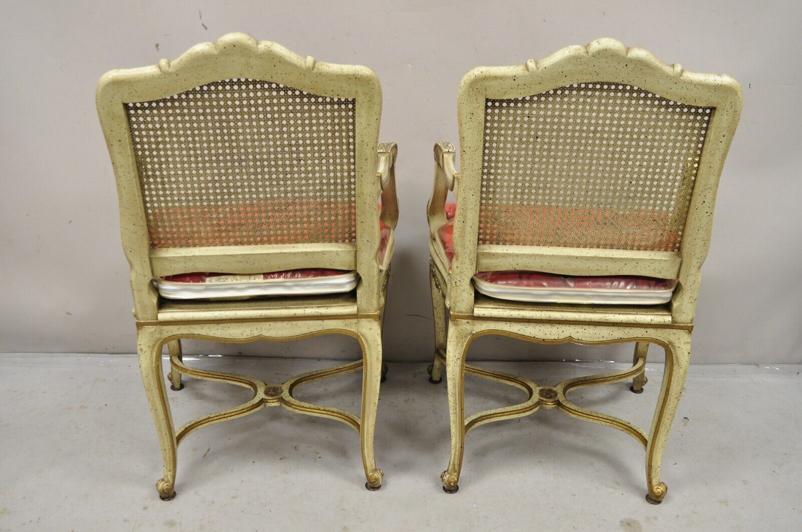 French Louis XV Style Cream Painted Carved Wood Cane Fauteuil Arm Chairs - Pair