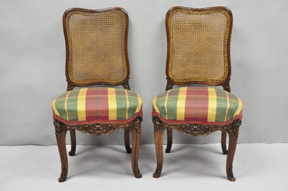 Antique French Country Louis XV Carved Walnut Cane Back Side Chairs - a Pair
