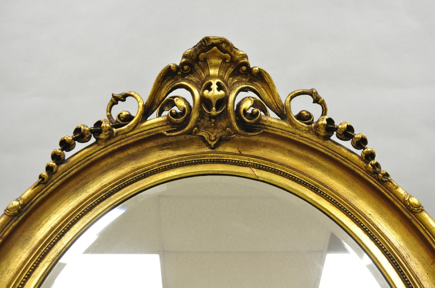 Antique French Victorian Gold Gilt Scroll Oval Beveled Glass Wall Mirror