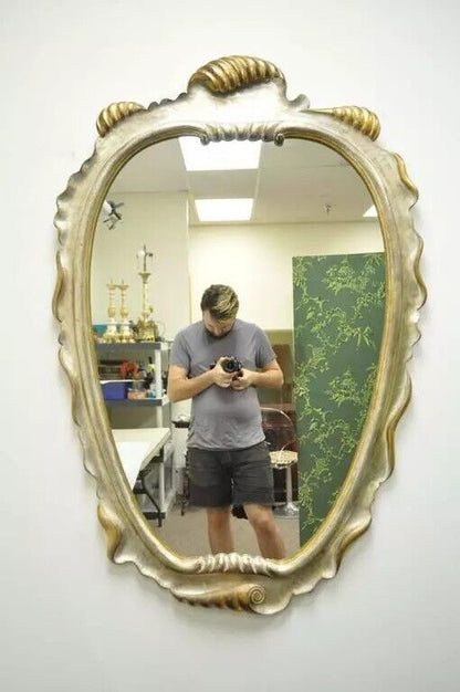 Italian Hollywood Regency Gold and Silver Giltwood Scroll Carved Wall Mirror