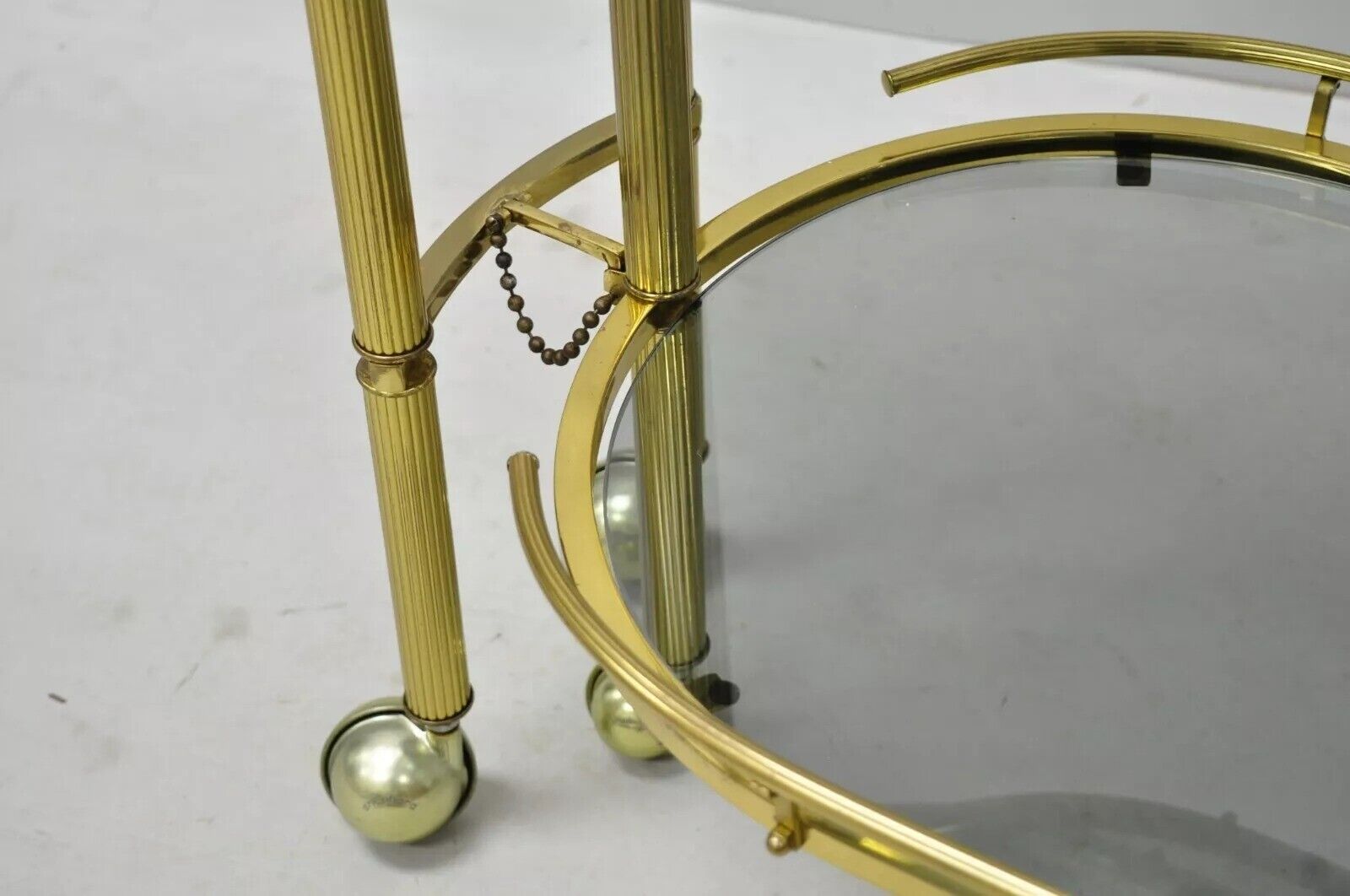 Italian Hollywood Regency Brass Swivel Rolling Bar Cart Server with Smoked Glass