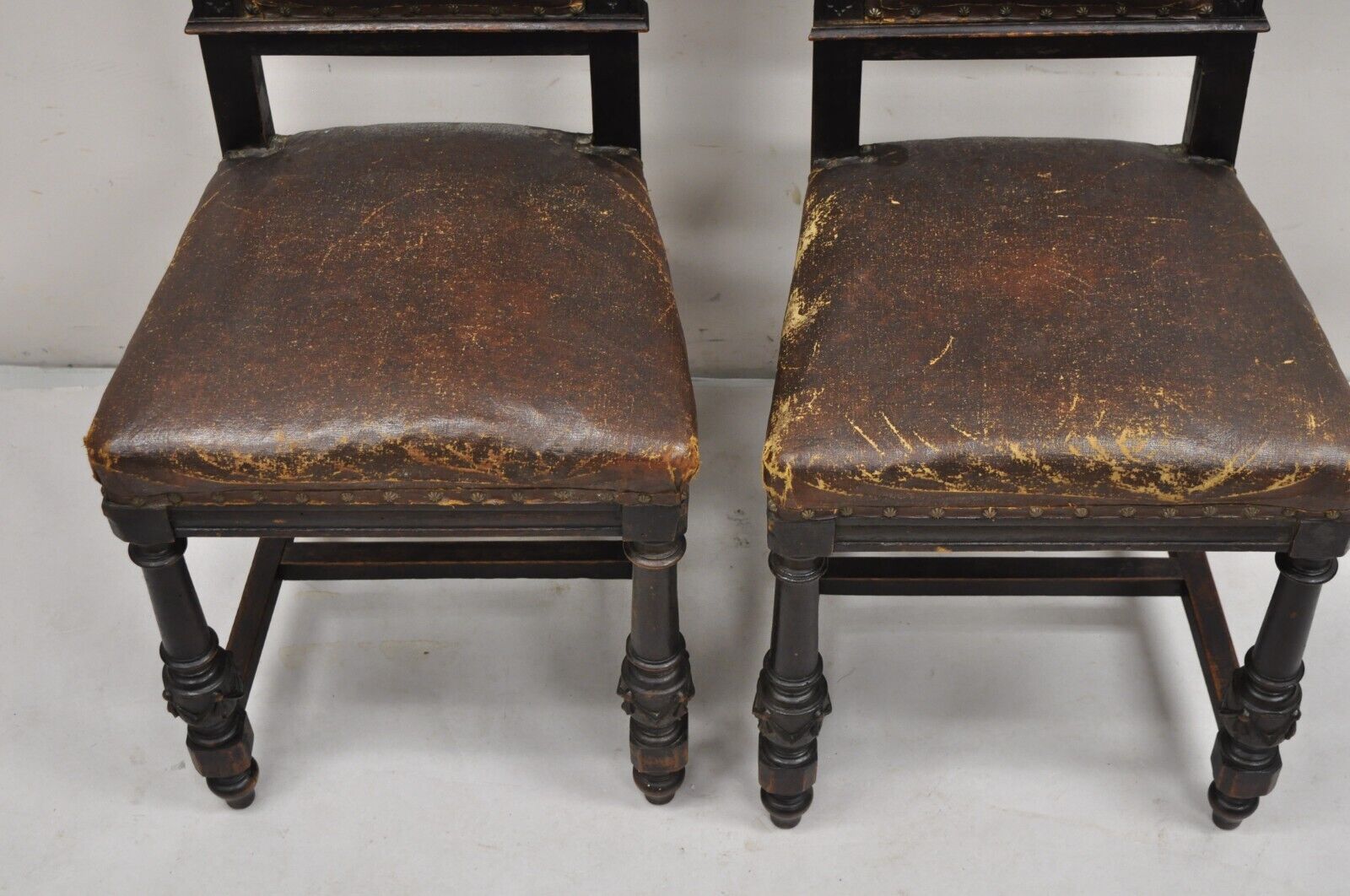 Antique Spanish Renaissance Carved Oak Wood Figural Leather Side Chairs - a Pair