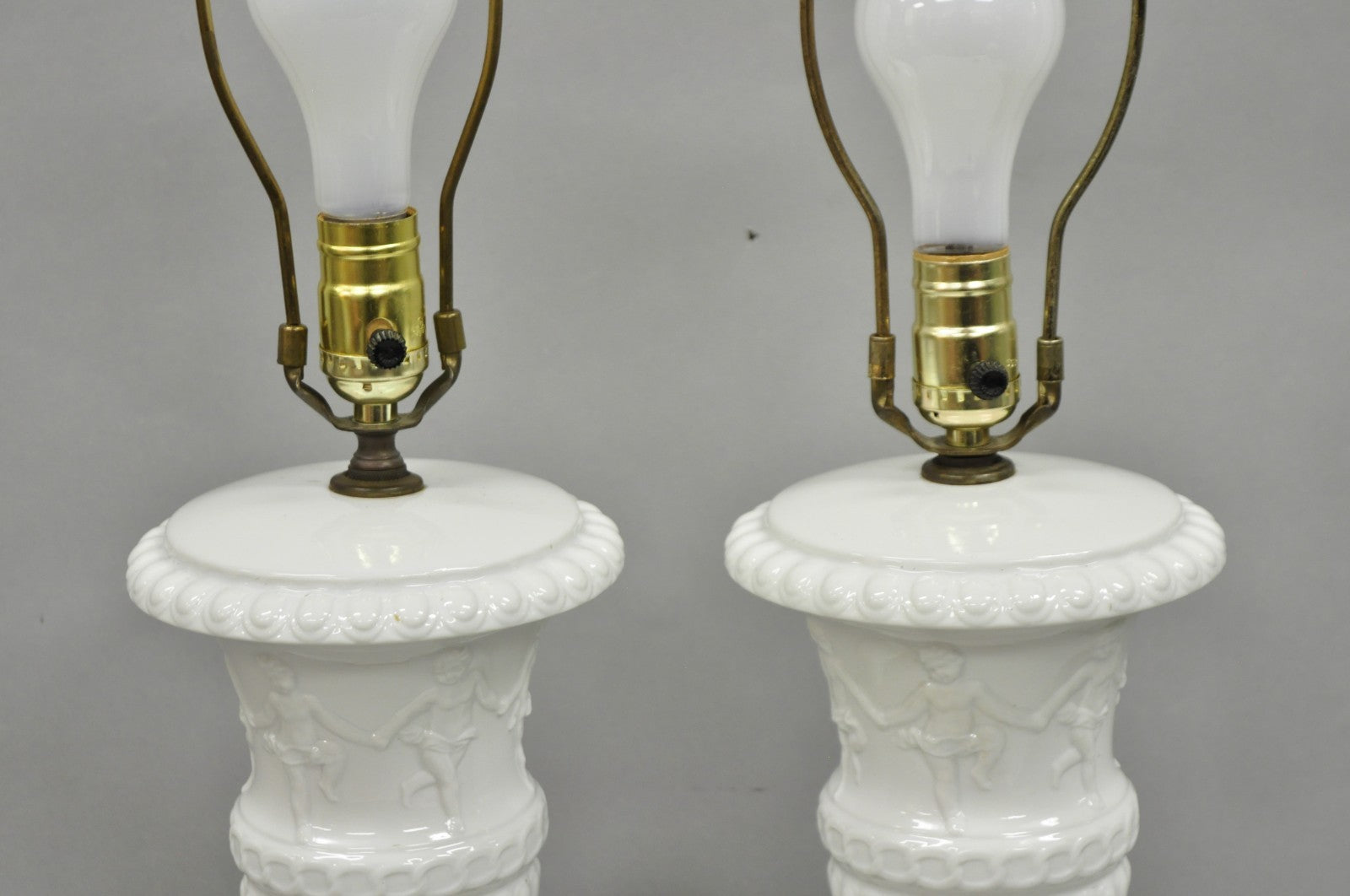 Vintage Italian Neoclassical White Porcelain Urn Table Lamps w/ Cherubs - a Pair