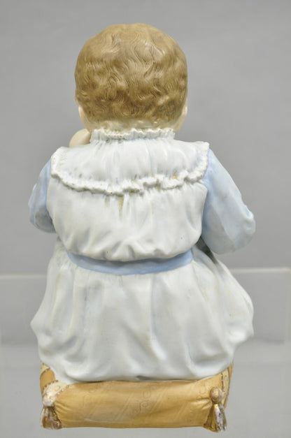Antique Bisque Porcelain Seated Baby Figurine in Circular Glass Display Cloche