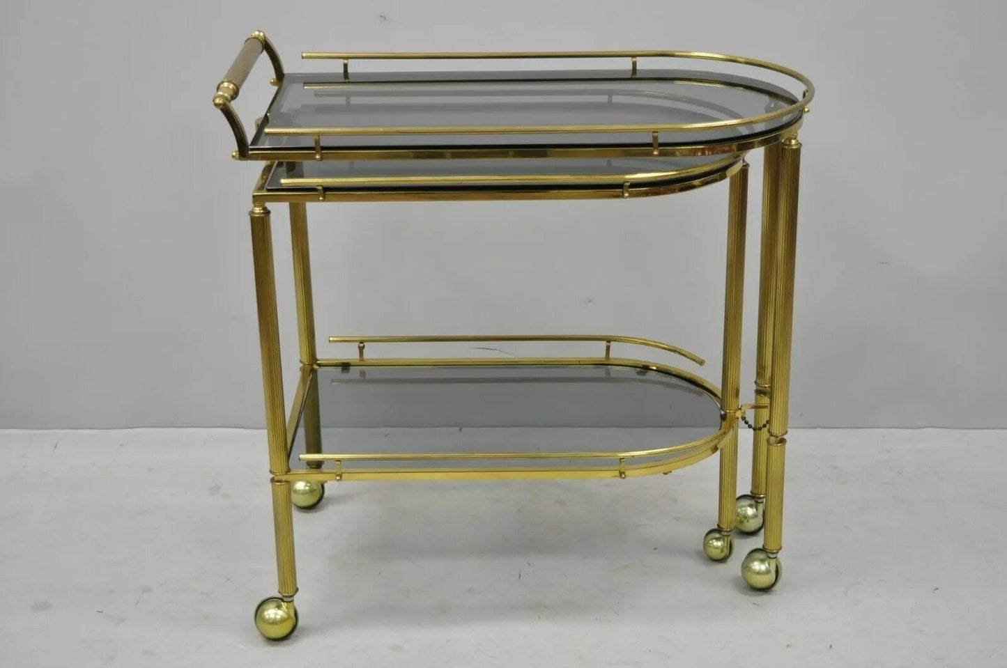 Italian Hollywood Regency Brass Swivel Rolling Bar Cart Server with Smoked Glass