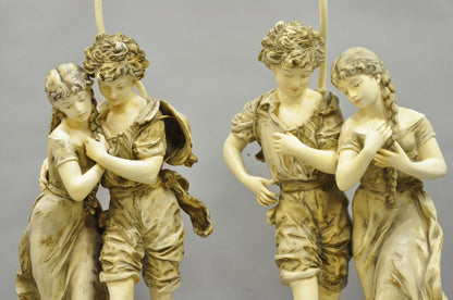 Antique L&F Moreau French Renaissance Large Figural Boy and Girl Table Lamp Pair