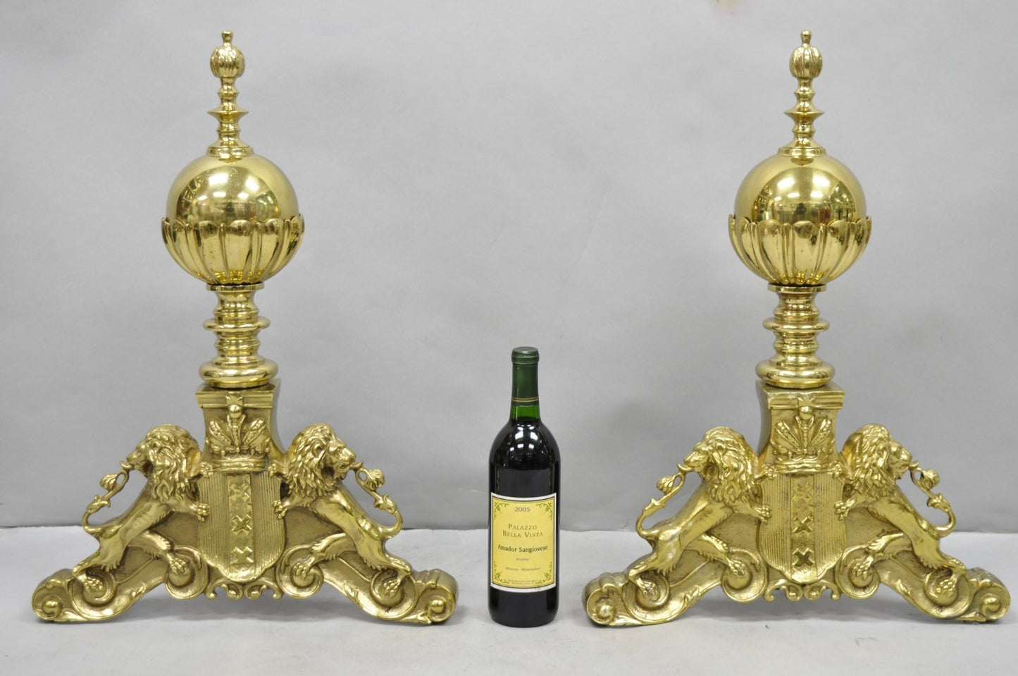 French Empire Renaissance Brass Lion Coat of Arms Cannonball Andirons - a Pair