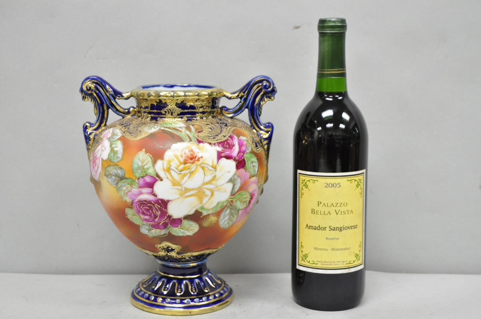 Antique Nippon Hand Painted Floral Design Cobalt Blue Porcelain Bolted Urn Vase
