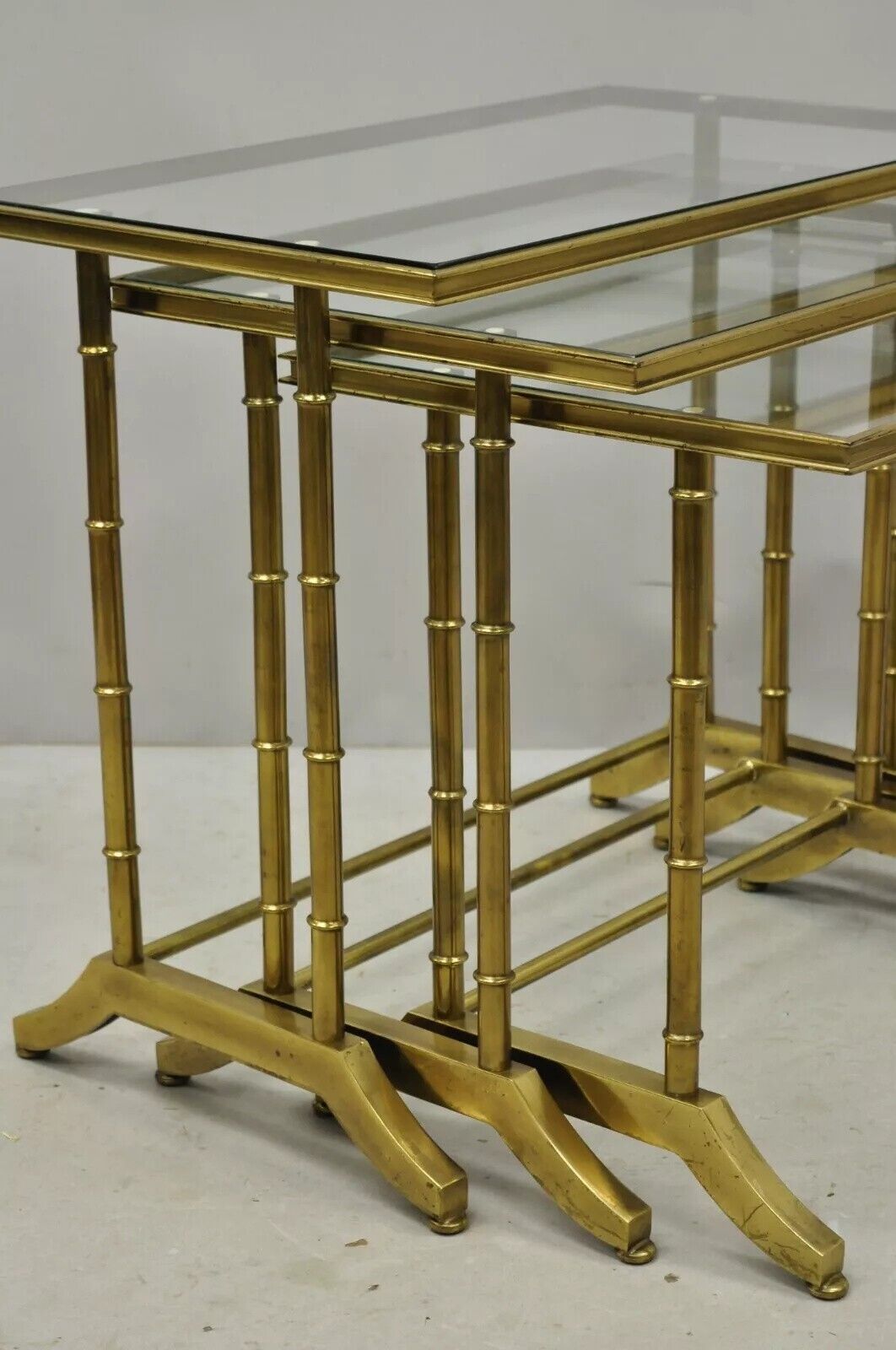 Mastercraft Hollywood Regency Brass Faux Bamboo Glass Top Nesting Side Tables