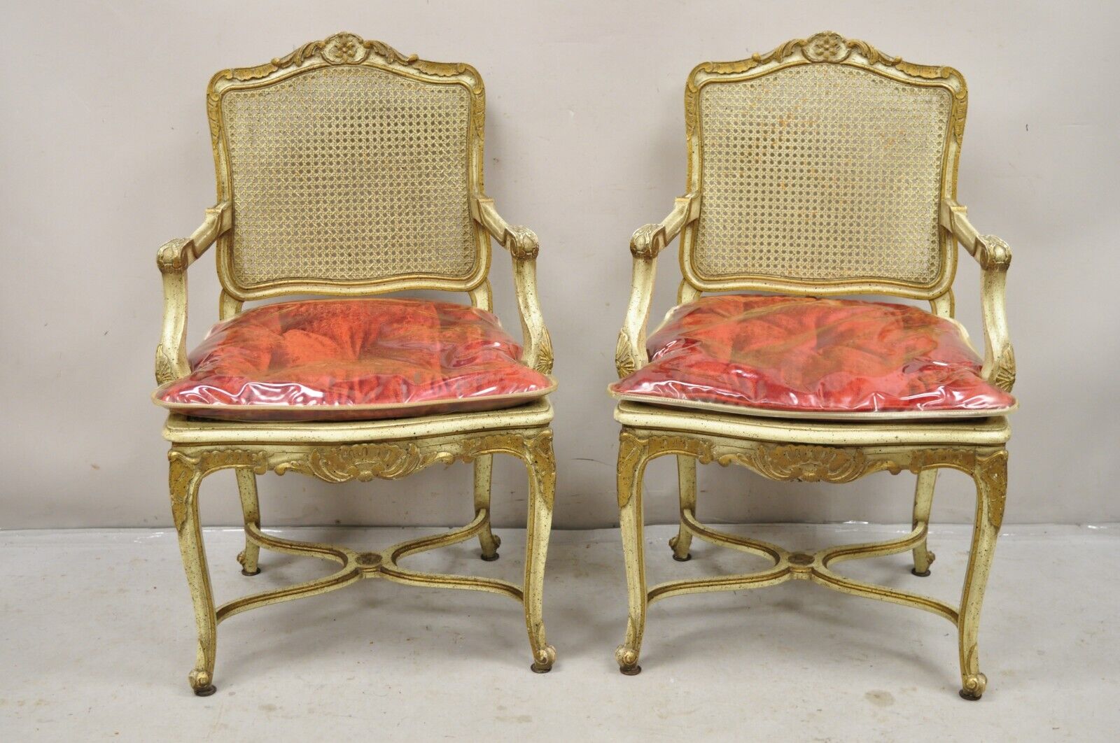 French Louis XV Style Cream Painted Carved Wood Cane Fauteuil Arm Chairs - Pair