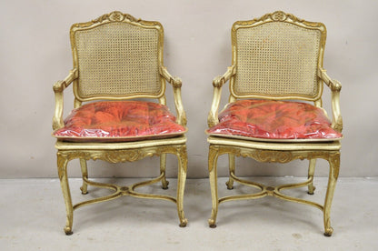 French Louis XV Style Cream Painted Carved Wood Cane Fauteuil Arm Chairs - Pair