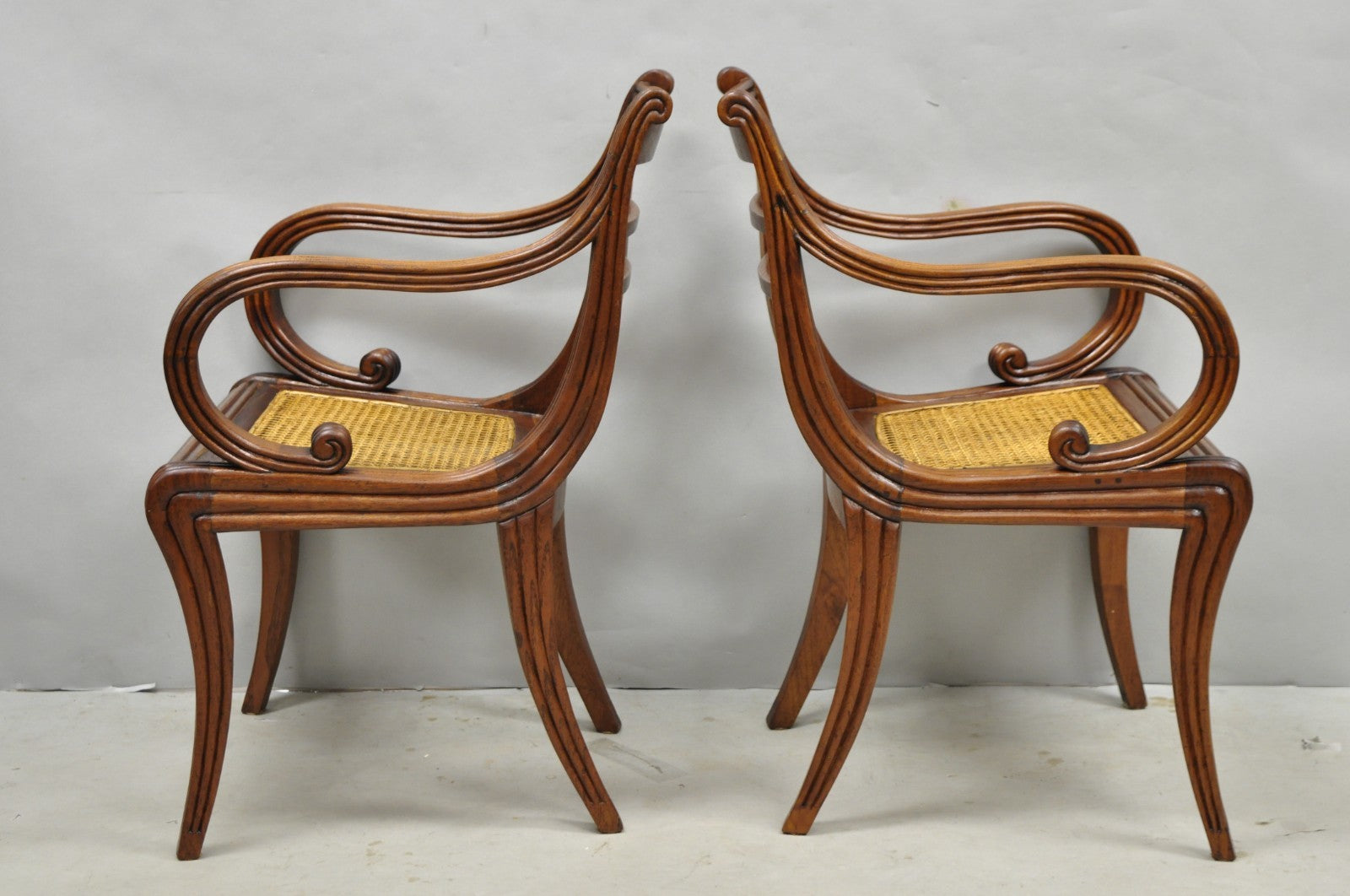 Vintage English Regency Style Cane Seat Mahogany Saber Leg Arm Chairs - a Pair