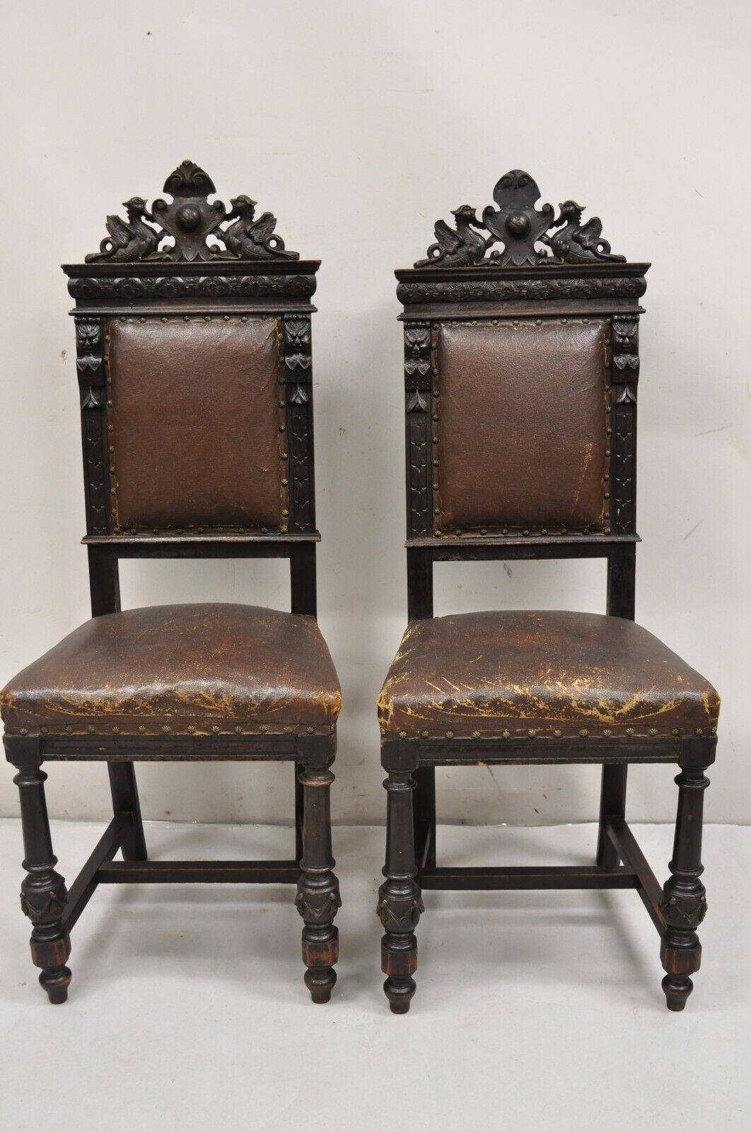 Antique Spanish Renaissance Carved Oak Wood Figural Leather Side Chairs - a Pair
