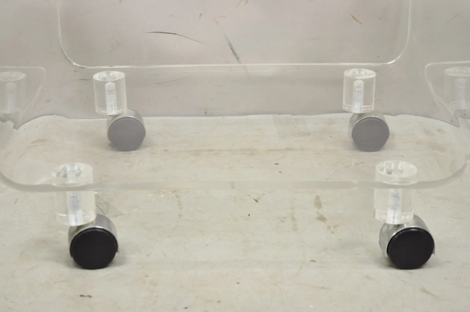 Vintage Clear Lucite Acrylic Mid Century Modern Rolling Side Tables - a Pair