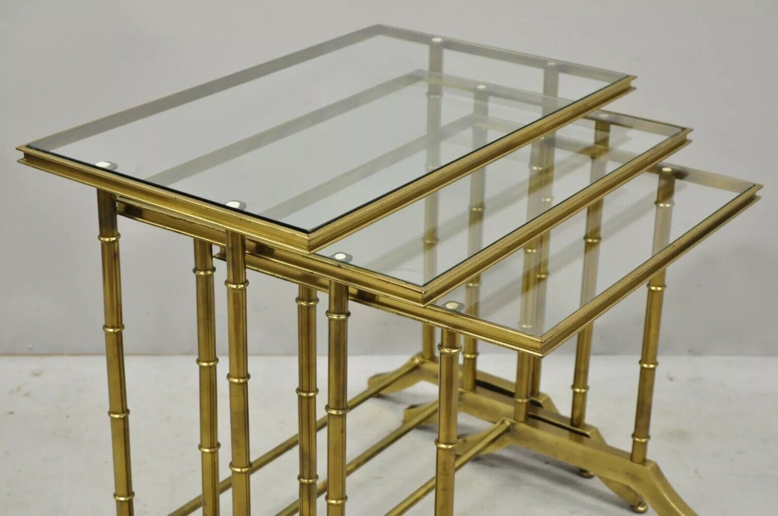 Mastercraft Hollywood Regency Brass Faux Bamboo Glass Top Nesting Side Tables
