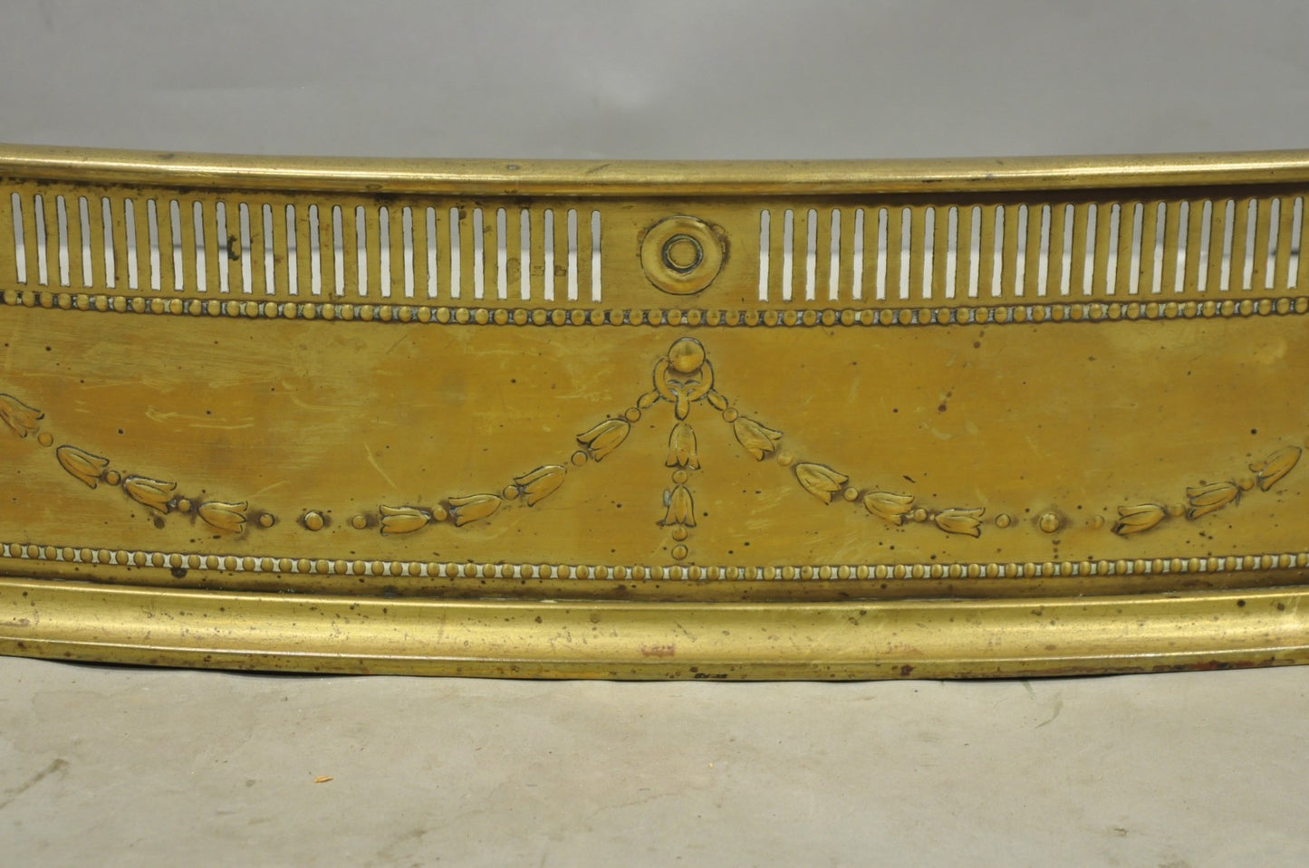 Antique English Victorian Serpentine Drape & Bellflower Brass Fireplace Fender