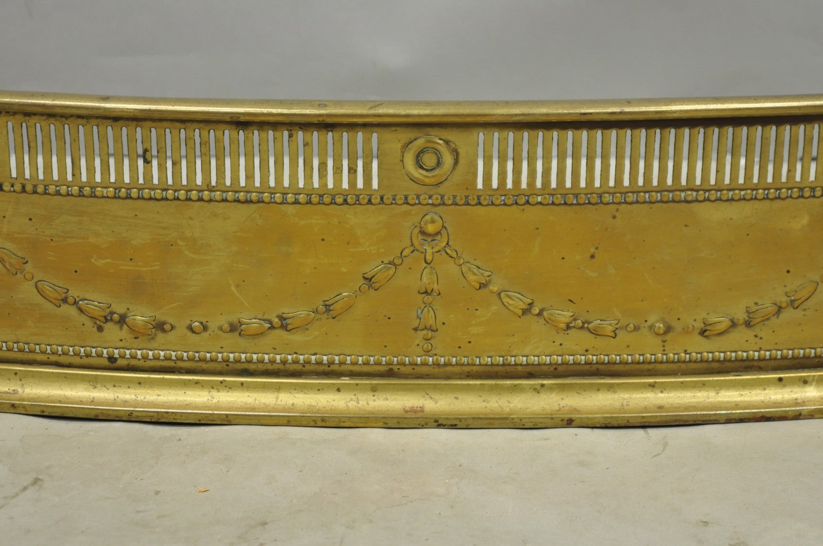 Antique English Victorian Serpentine Drape & Bellflower Brass Fireplace Fender