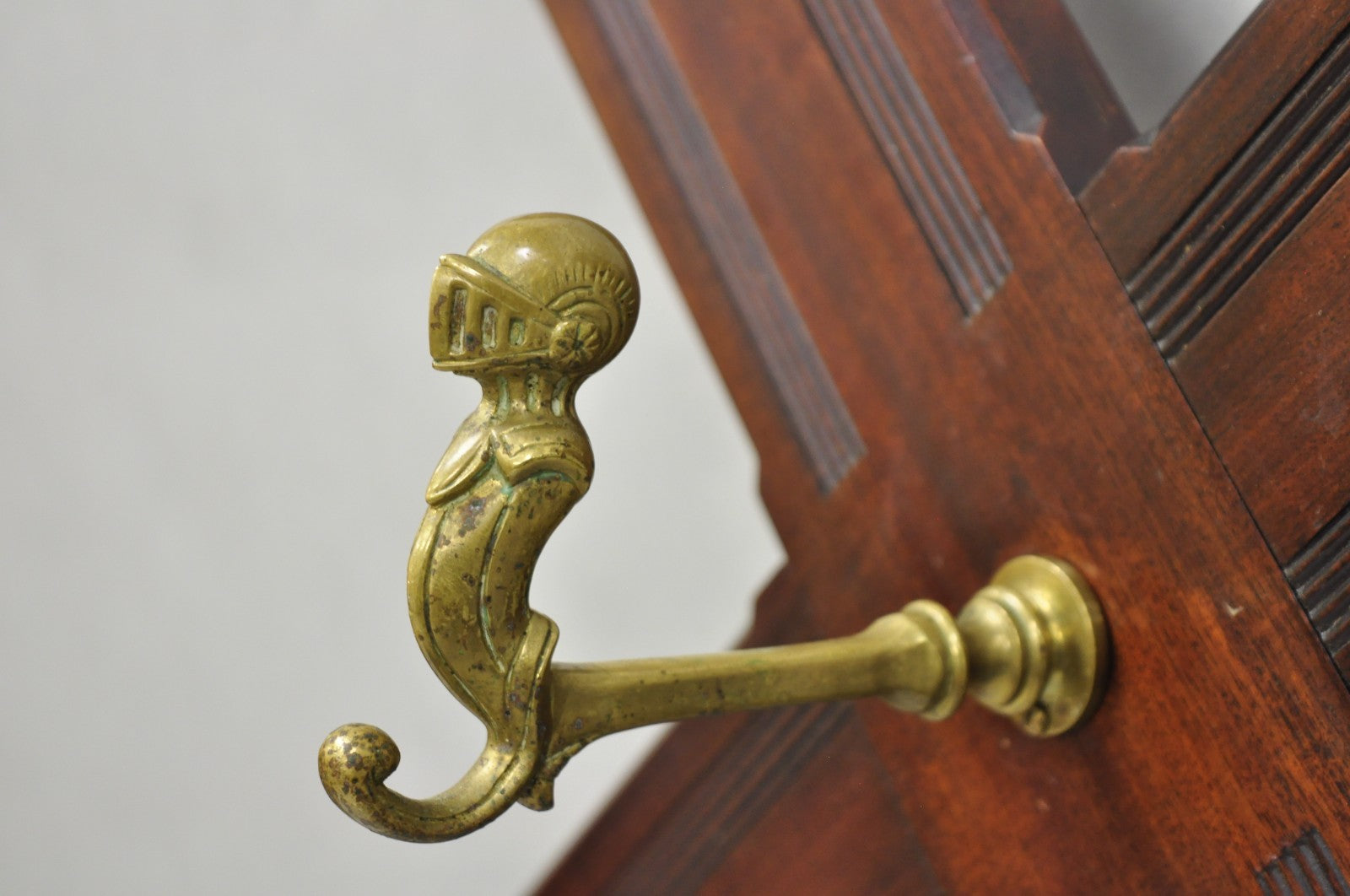 Antique Victorian Mahogany X-Form Wall Coat Rack w/ Brass Knight's Helmet Hooks