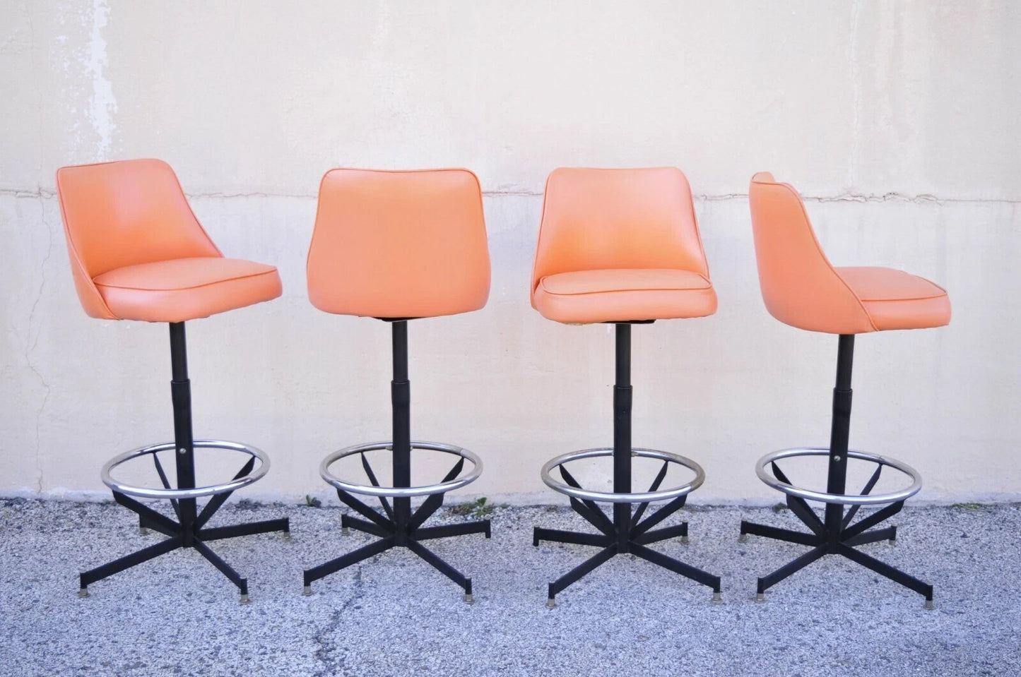 Vintage Mid Century Modern Atomic Orange Vinyl Metal Swivel Barstools - Set of 4