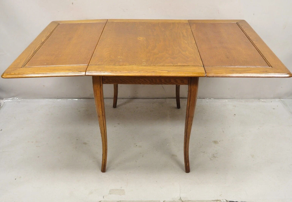 Vintage Mid Century Modern Klismos Saber Leg Oak Wood Drop Leaf Dining Table