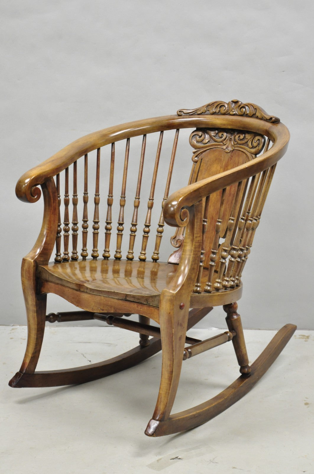 Antique American Victorian Carved Walnut Spindle Back Rocker Rocking Chair