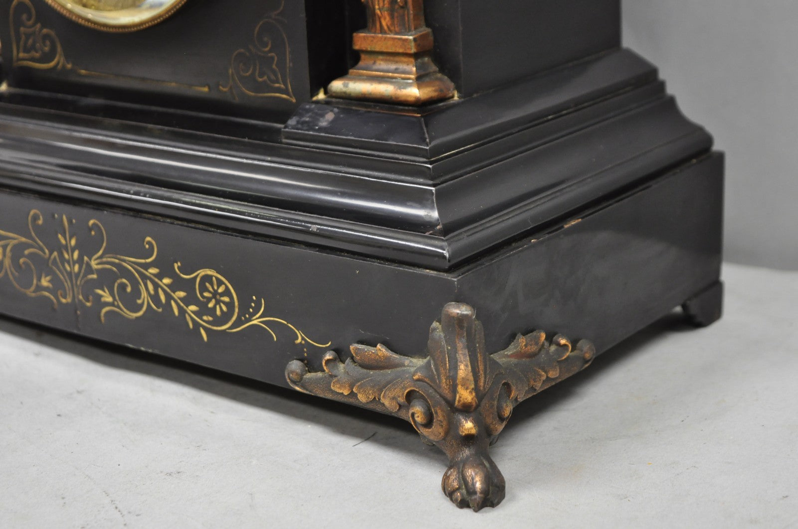 Antique Ansonia Black Mantel Clock with Bronze Coated Columns and Claw Feet