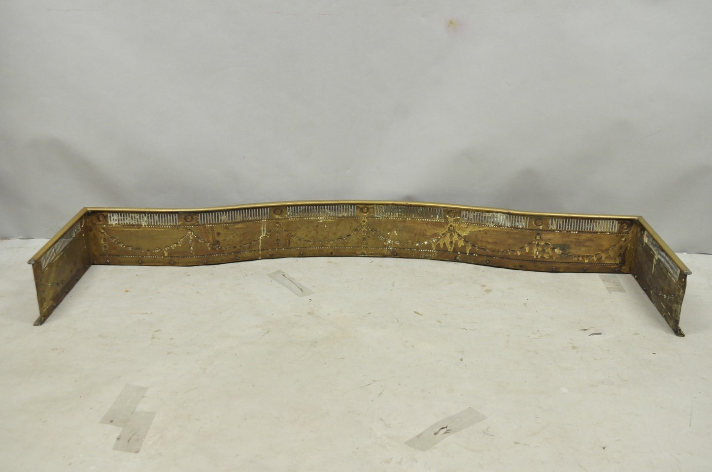 Antique English Victorian Serpentine Drape & Bellflower Brass Fireplace Fender