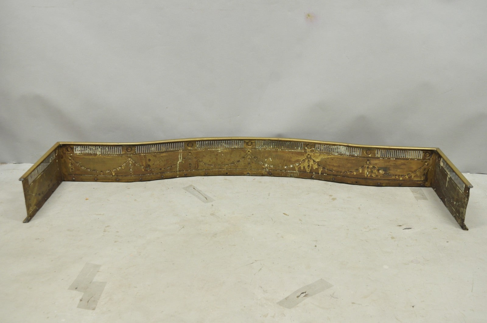 Antique English Victorian Serpentine Drape & Bellflower Brass Fireplace Fender