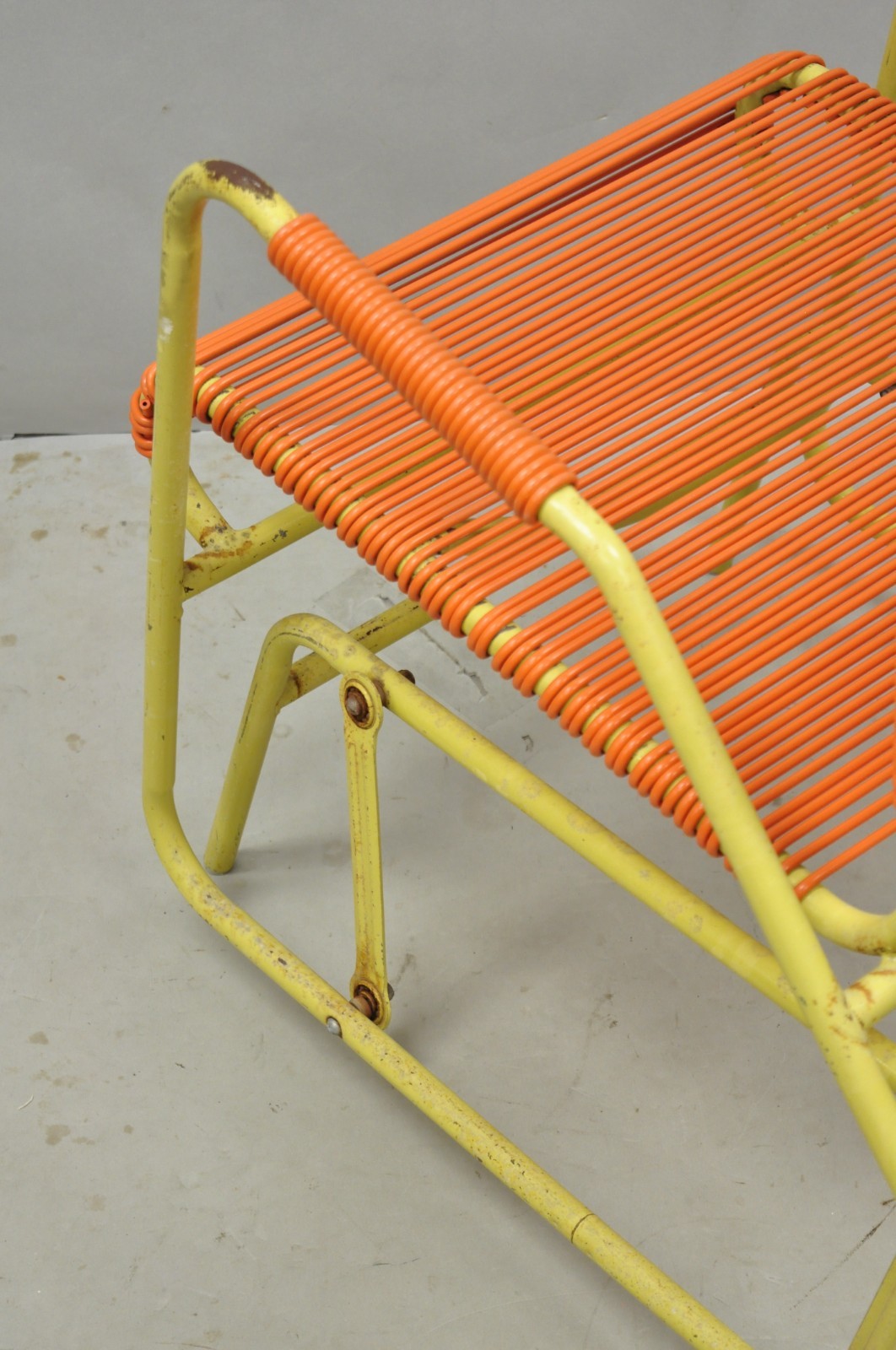 Vintage Mid Century Modern Orange Vinyl Spaghetti Strap Glider Lounge Chair