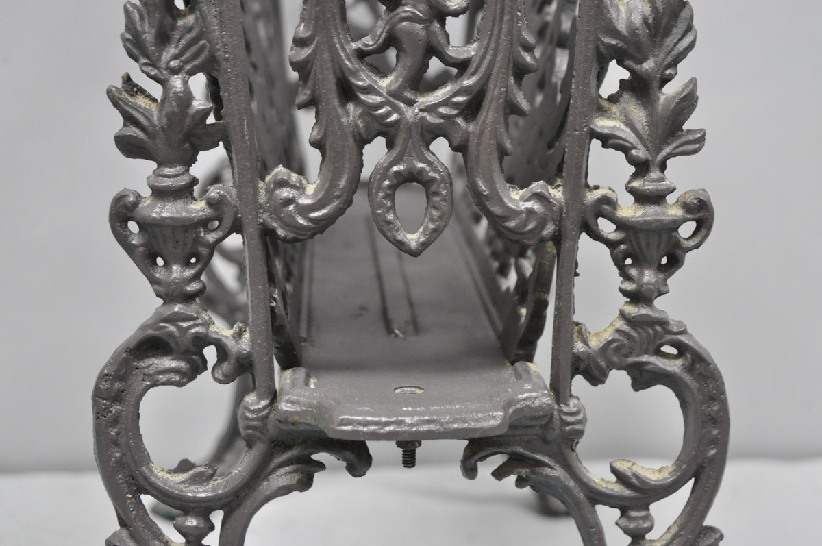 Vintage French Renaissance Victorian Style Cast Iron Magazine Rack with Cherubs
