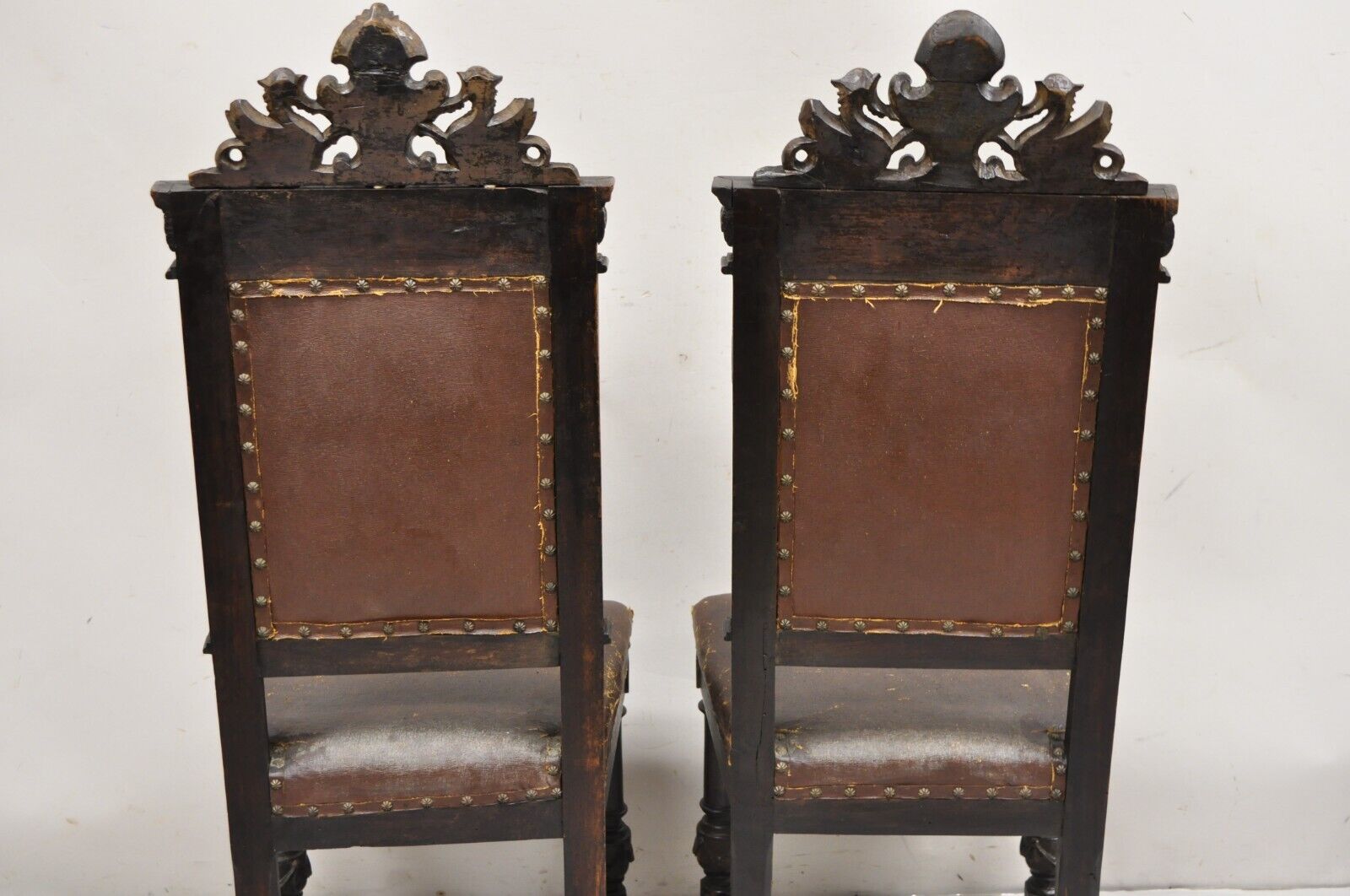 Antique Spanish Renaissance Carved Oak Wood Figural Leather Side Chairs - a Pair
