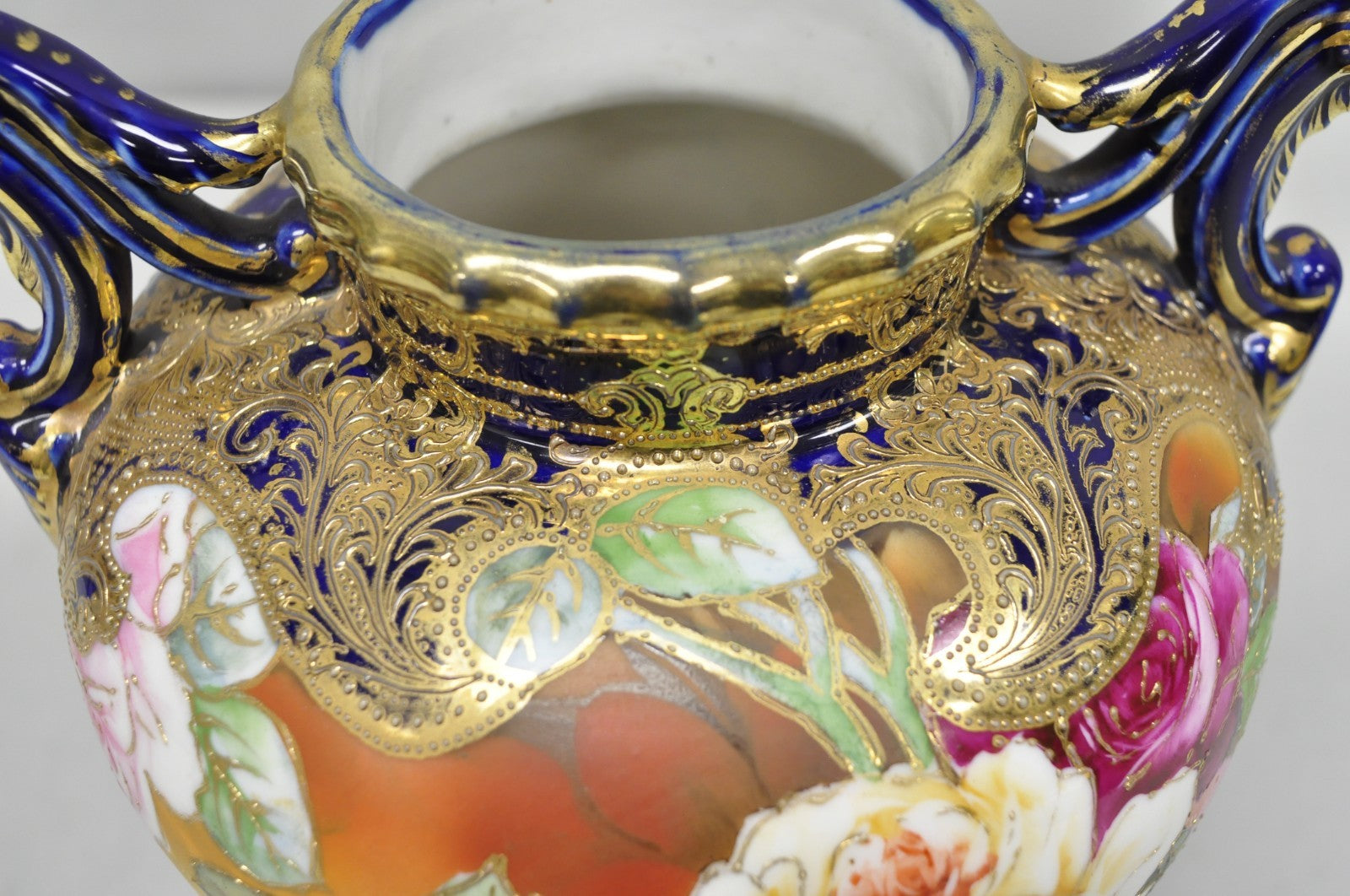 Antique Nippon Hand Painted Floral Design Cobalt Blue Porcelain Bolted Urn Vase