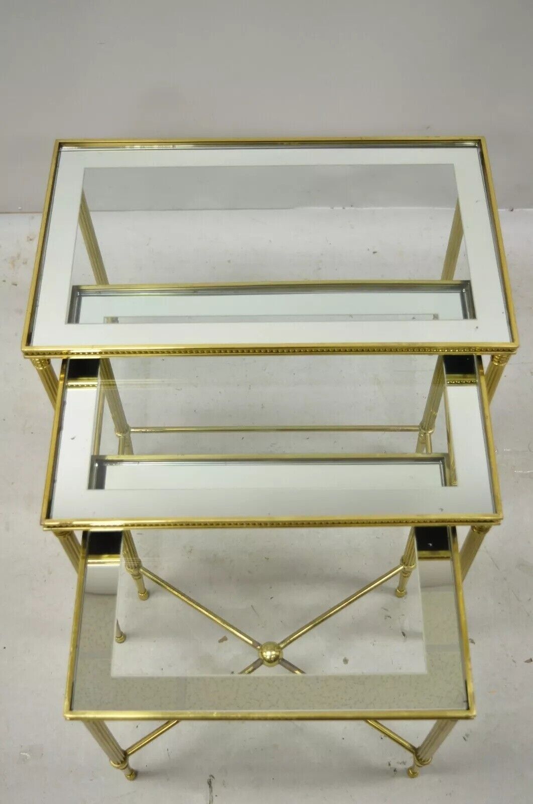 Italian Hollywood Regency Brass Mirror Glass Top Nesting Side Tables - Set 3