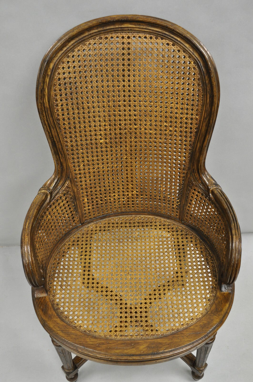 Vintage French Louis XVI Style Cane Balloon Back Walnut Arm Chairs - a Pair