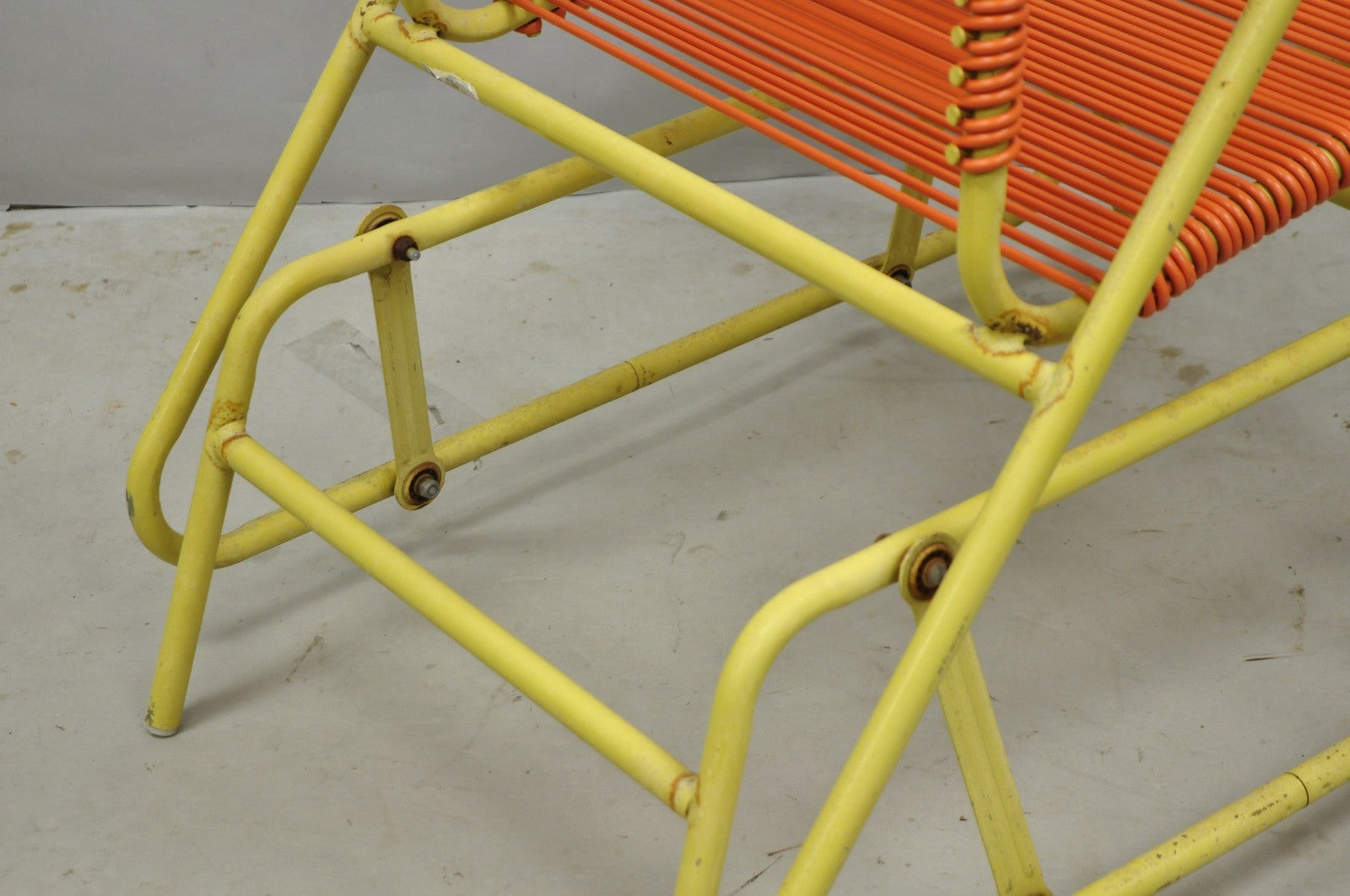 Vintage Mid Century Modern Orange Vinyl Spaghetti Strap Glider Lounge Chair