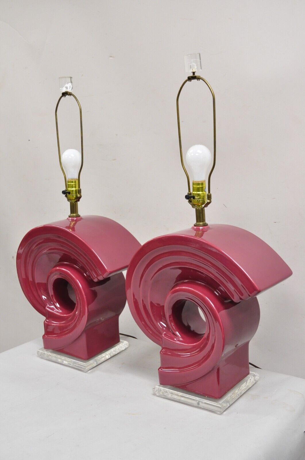 Vintage Postmodern Cranberry Red Sculptural Snail Scroll Ceramic Table Lamp Pair