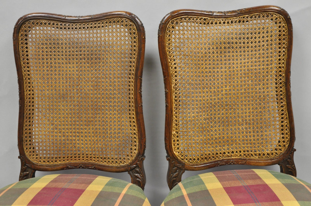 Antique French Country Louis XV Carved Walnut Cane Back Side Chairs - a Pair