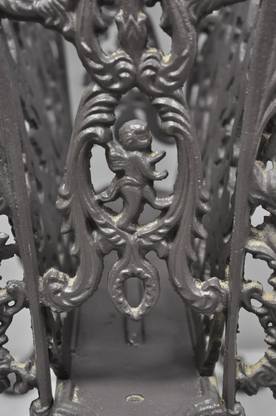 Vintage French Renaissance Victorian Style Cast Iron Magazine Rack with Cherubs